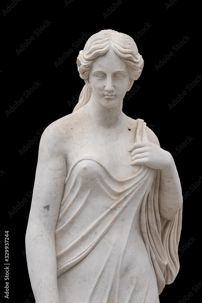Marble statue of an ancient Greek goddess isolated on black background Marble statue of an ancient Greek goddess isolated on black background