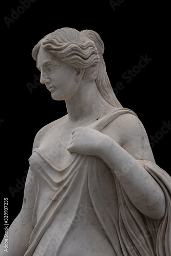 Marble statue of an ancient Greek goddess isolated on black background