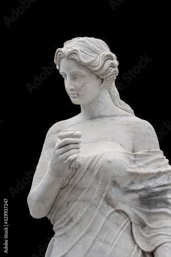 Fotografija Marble statue of an ancient Greek goddess isolated on black background