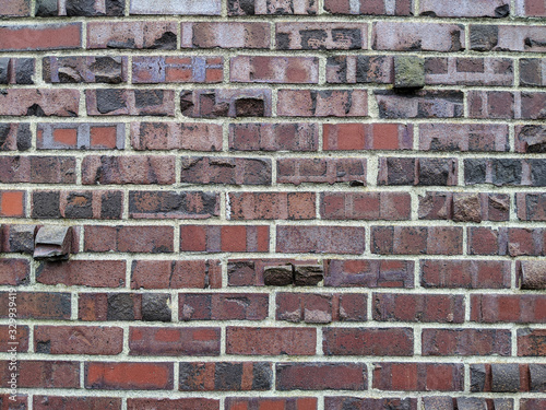 Close up of a textured brick wall outdoors