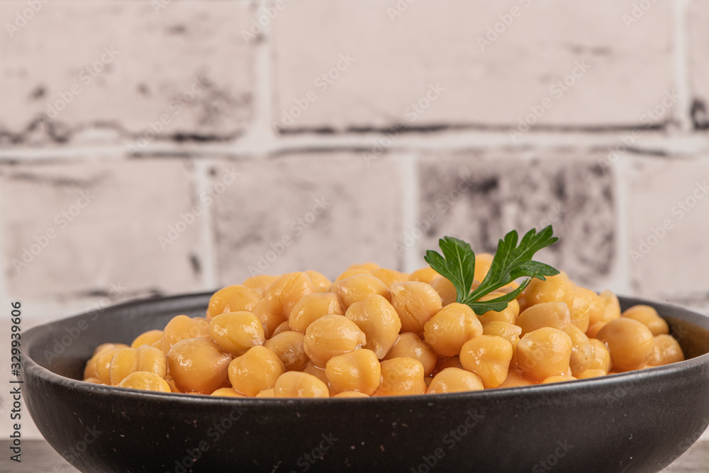 Chickpeas in a bowl on kitchen countertop Chickpeas in a bowl on kitchen countertop