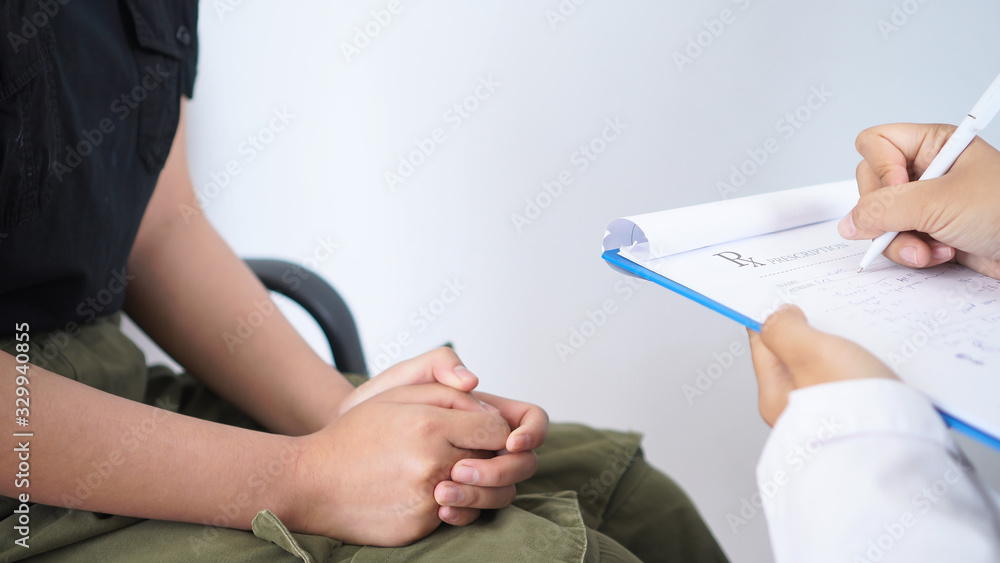 Doctor writing prescription clipboard record hold stethoscope, Medical