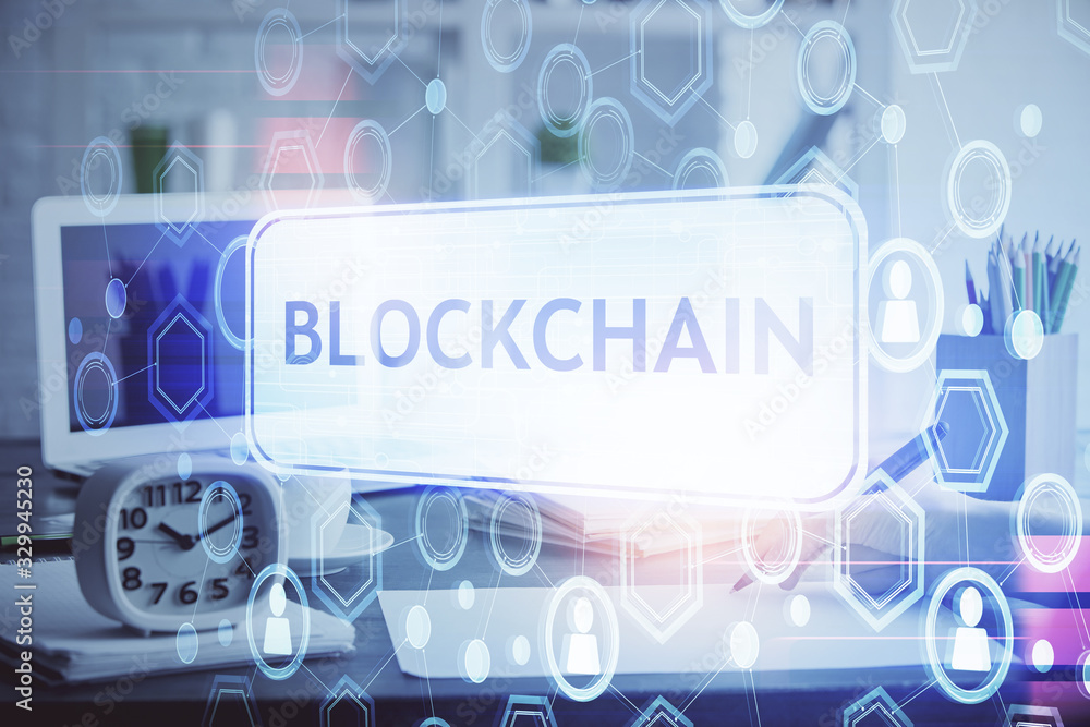 Cryptocurrency hologram over hands taking notes background. Concept of blockchain. Multi exposure Cryptocurrency hologram over hands taking notes background. Concept of blockchain. Multi exposure