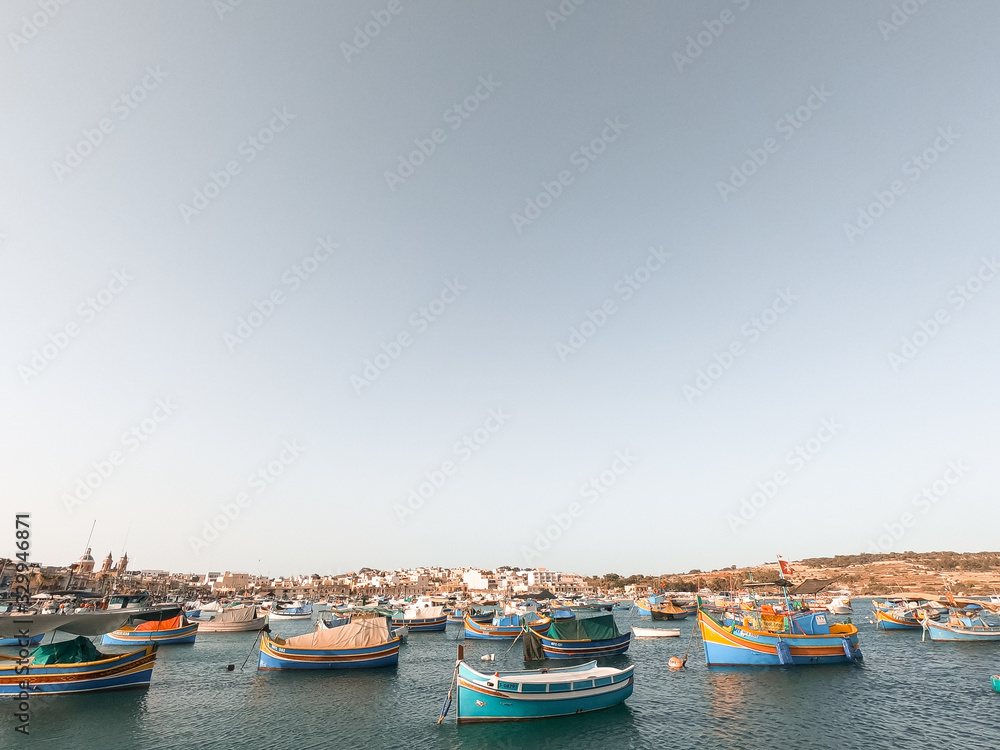 Colorful fishing boats are located in the village of Marsaxlokk.