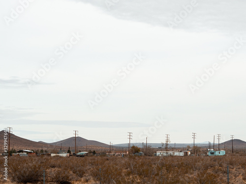 Mojave, United States - December 02, 2019: Car traffic by road in the Mojave Desert.