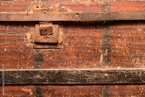 old lock on wooden box