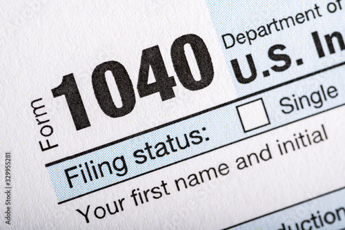 A stack of United States tax forms for individuals. 