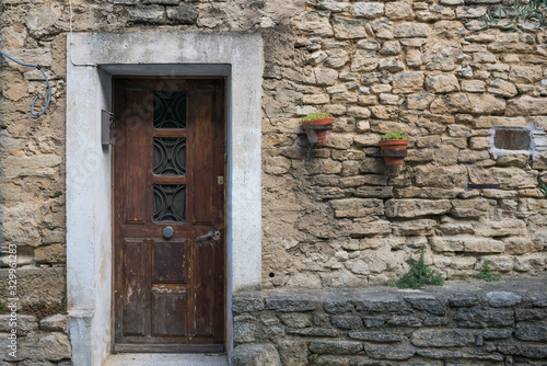 Ancient brick wall and wooden door