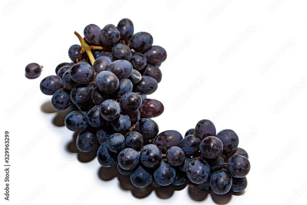 Bunches of dark grapes isolated on white background Bunches of dark grapes isolated on white background