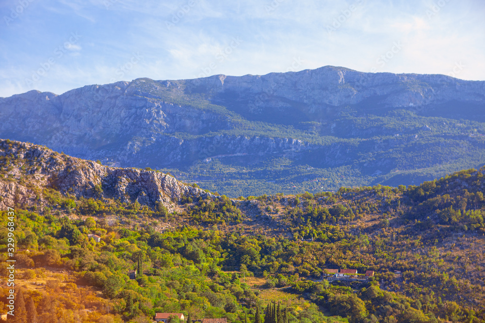 scenery with village situated in the mountains scenery with village situated in the mountains