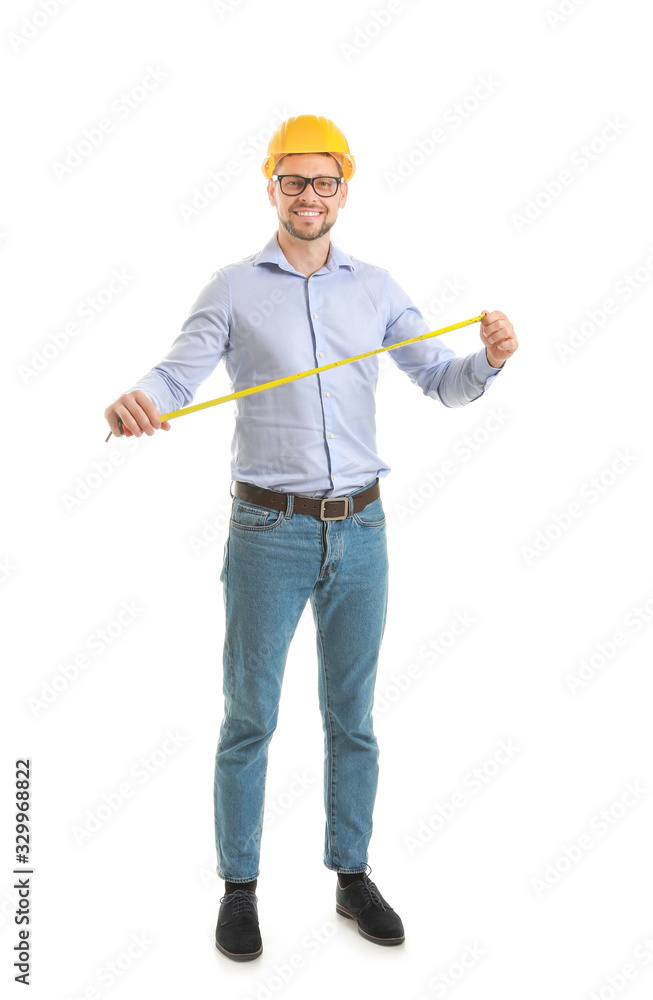 Male engineer with tape measure on white background Male engineer with tape measure on white background