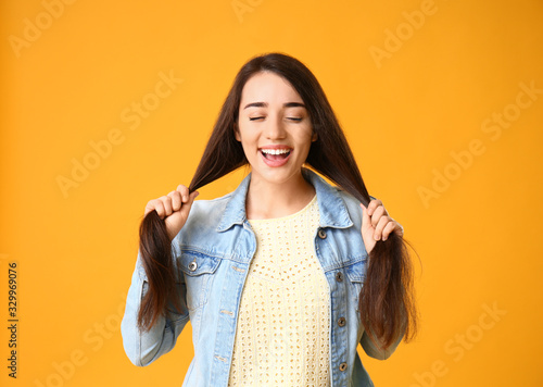 Stylish young woman on colo...