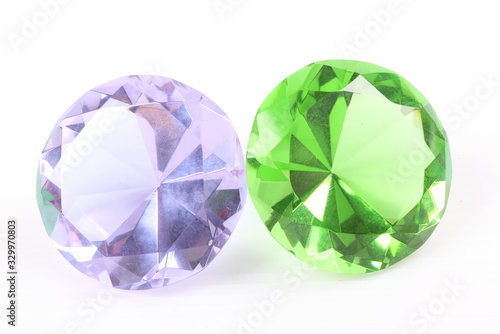 purple and green diamond on white surface
