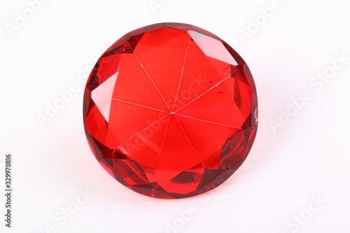 Red diamond on white surface