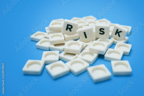 Risk wording on block lettering isolated on white background