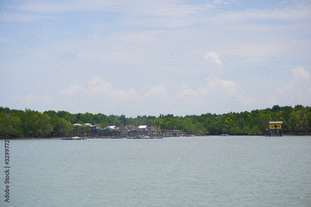 Pulau Ketam is an island at the mouth of the Klang River, near Port Klang, downstream from Kuala Lumpur. It host Chinese fishing villages comprising houses on stilts. 