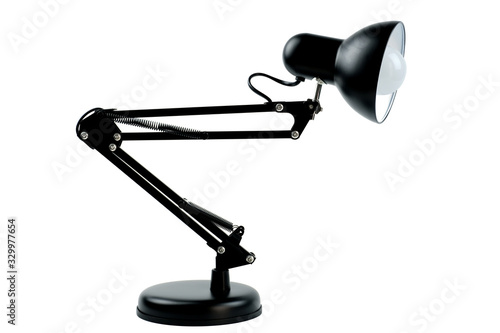 Black desk lamp isolated on white background.
