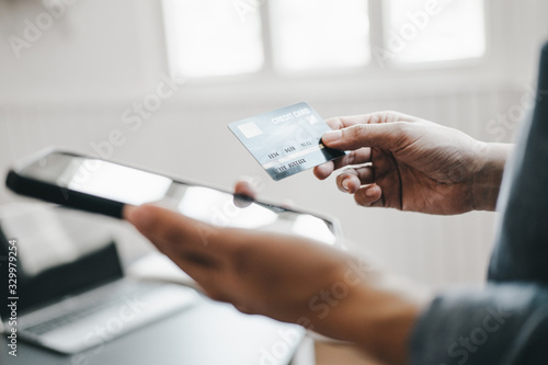 beautiful woman holding credit card using smartphone enjoy shopping website online, shopping concept.