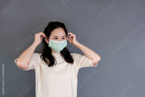 Girl with mask to protect her from virus or pollution