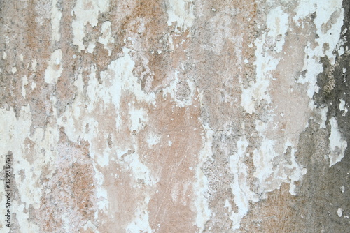 Closeup old weathered concrete wall texture with plaster