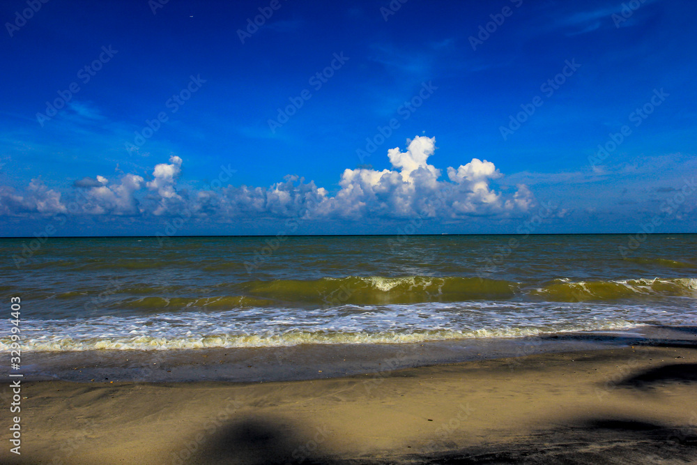 Fototapeta premium The background of a cloudy sky, colorful like a storm, and rain later, with blurring of wind and sea together, is a phenomenon that occurs naturally.