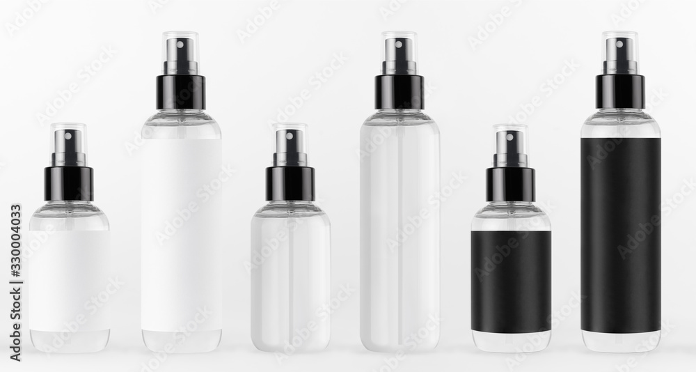 Collection tall and low spray dispenser bottles for cosmetics - transparent and with black, white label in a row on white background, mock up for design. Collection tall and low spray dispenser bottles for cosmetics - transparent and with black, white label in a row on white background, mock up for design.