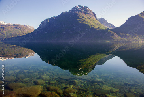 Fototapeta Naklejka Na Ścianę i Meble -  Traveling Norway along the fjords with beautiful reflections