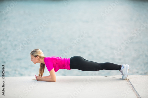 beautiful young woman in sportswear in summer © Alexandr