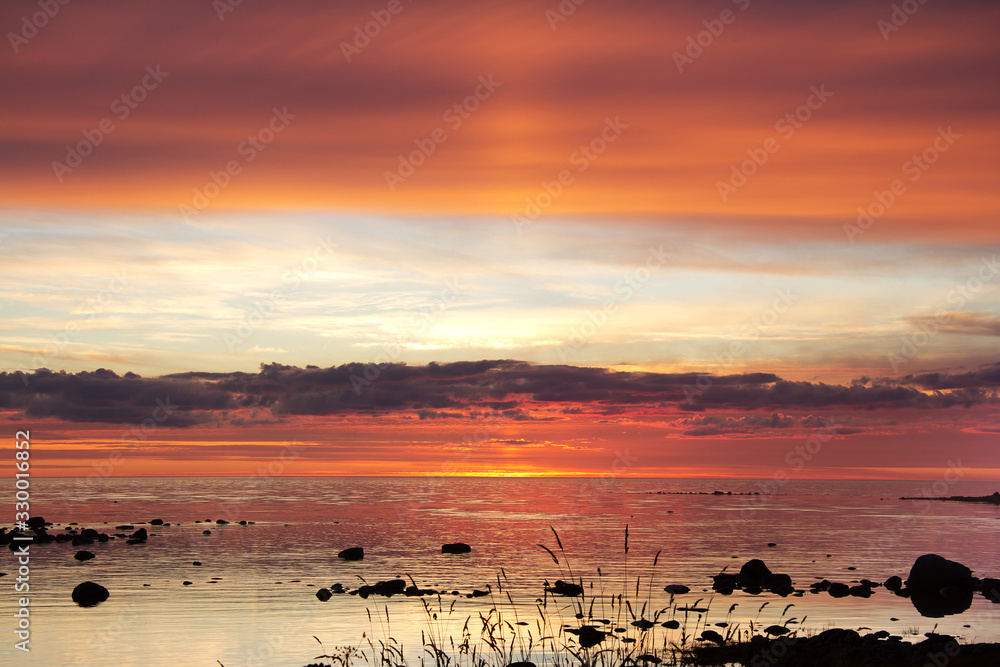 Red sunset on the Arctic Ocean in dark tone Red sunset on the Arctic Ocean in dark tone