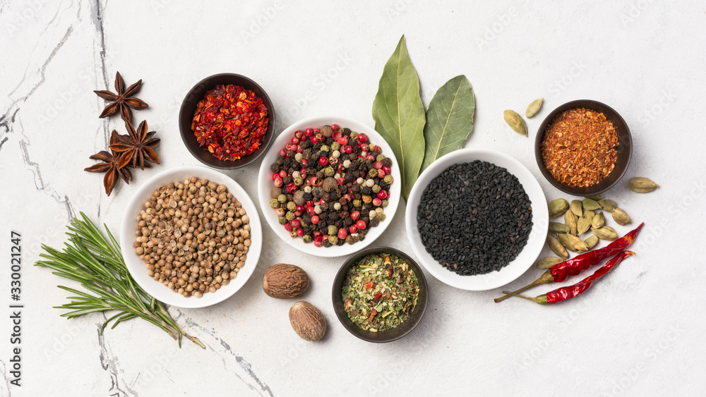 Different spices, kitchen herbs and seeds for tasty meals Different spices, kitchen herbs and seeds for tasty meals