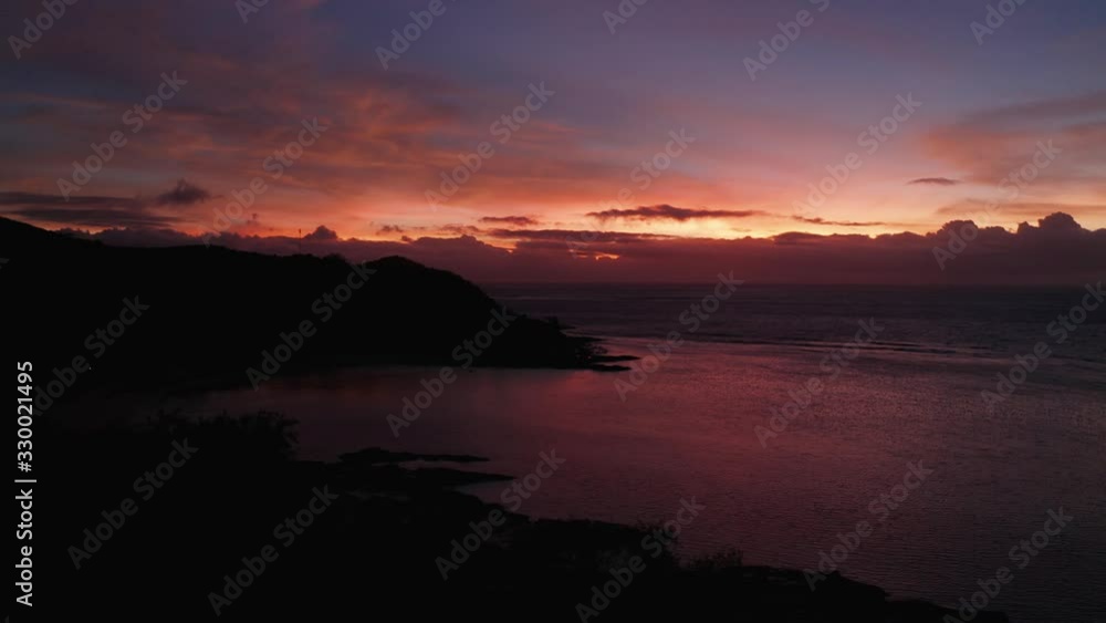 A Dramatic And Vibrant Sunset In Fiji Island - A Relaxing Scenic Attraction On A Summer Vacation - Aerial Shot A Dramatic And Vibrant Sunset In Fiji Island - A Relaxing Scenic Attraction On A Summer Vacation - Aerial Shot