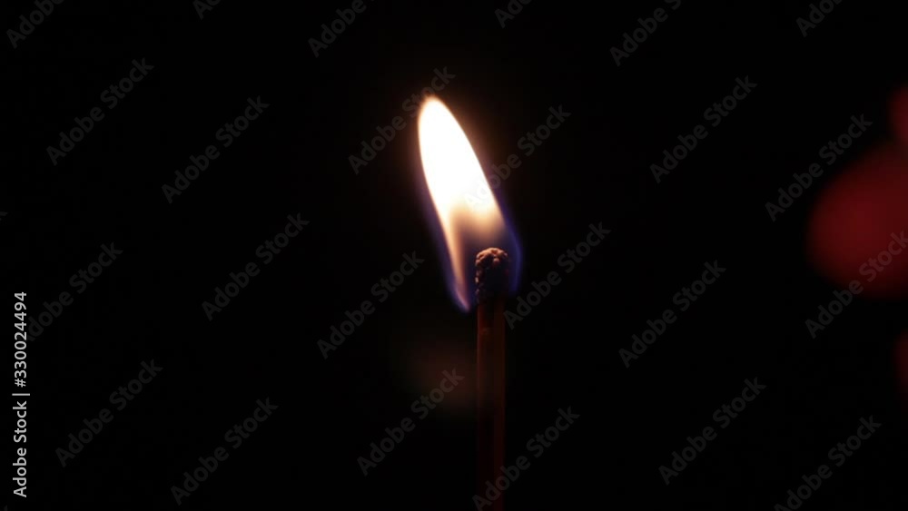 lighting match stick and burning on background. Burning match stick lights and goes out. close up lighting match stick and burning on background. Burning match stick lights and goes out. close up