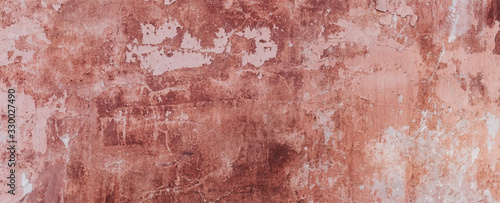 Cracked red stone texture cement background photo