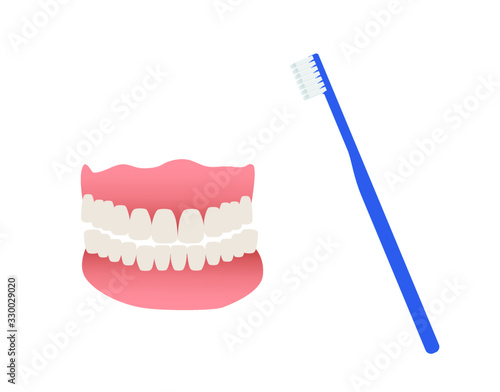 denture-and-toothbrush