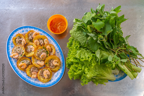Delicious Vietnamese street food- fried shrimp pancakes, Banh khot