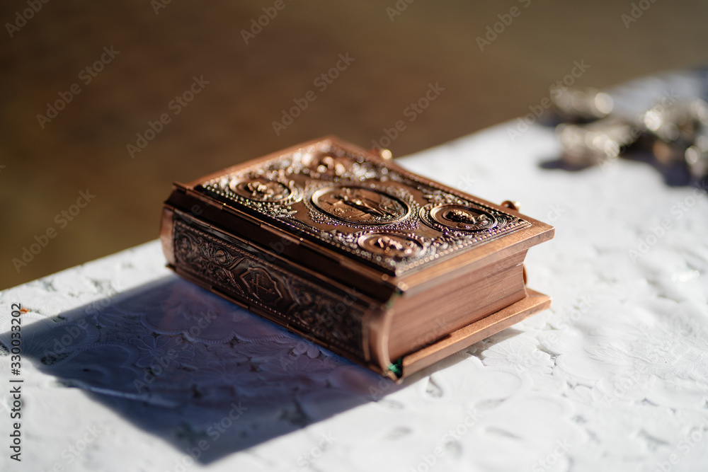 Bible or prayer book on table in Orthodox Church Bible or prayer book on table in Orthodox Church