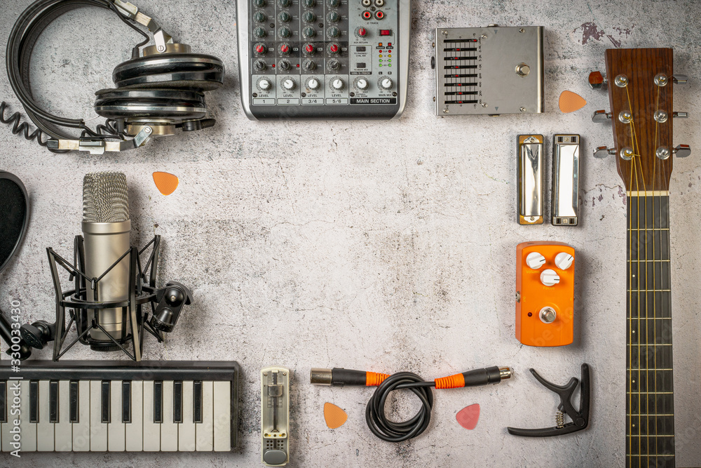 Singer-Songwriter and home recording, lifestyle music concept. Flat lay  with musician and sound engineer stuff like guitar, mixer, microphone,  keyboard, cables, headphones and so on. Vintage filtered Stock Photo |  Adobe Stock