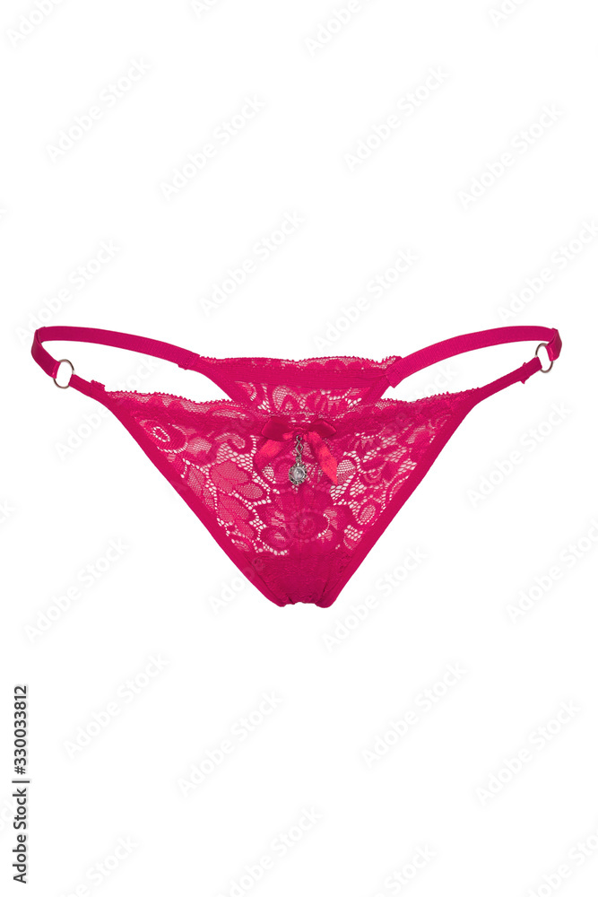 Subject shot of crimson lace panties with a silk bow and a silver pendant with a clear crystal. The sexy thong with flower pattern and thin side straps is isolated on the white background.