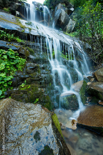 Scenic waterfall in the green Carpathian mountains