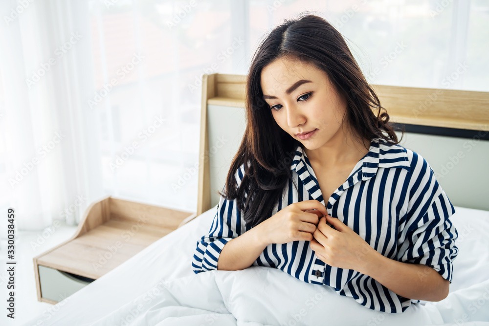 Images of young woman going to take off shirts By beginning to remove the buttons to begin pleasure, sex concept. Images of young woman going to take off shirts By beginning to remove the buttons to begin pleasure, sex concept.