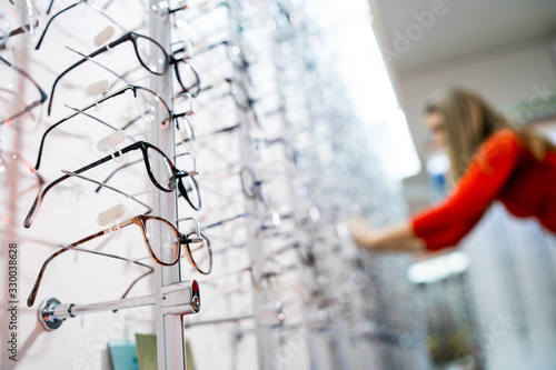 Prescription glasses for sale and on display at an optician's office.