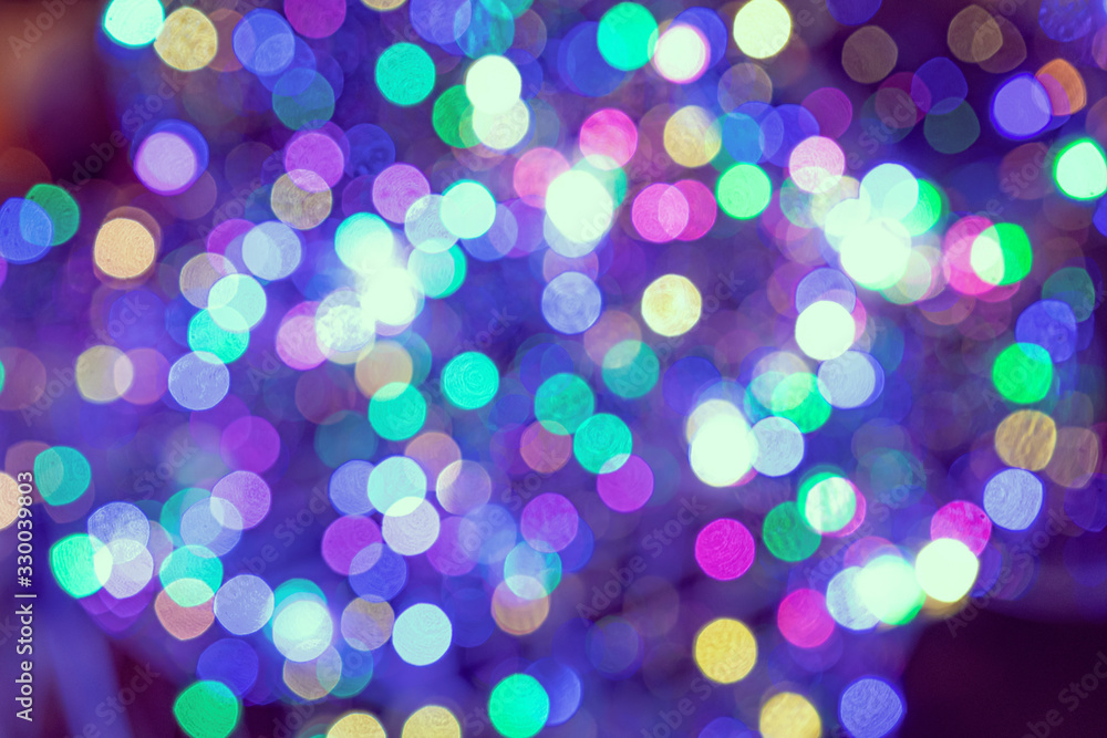 Christmas background. Festive elegant abstract background with colorful bokeh lights and stars Christmas background. Festive elegant abstract background with colorful bokeh lights and stars
