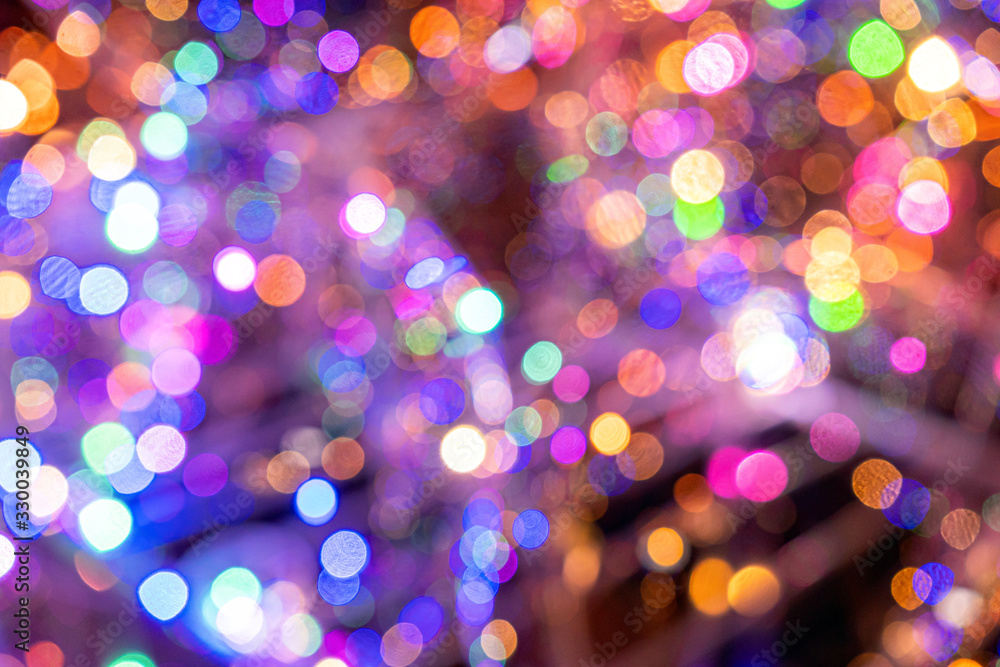 Christmas background. Festive elegant abstract background with colorful bokeh lights and stars Christmas background. Festive elegant abstract background with colorful bokeh lights and stars