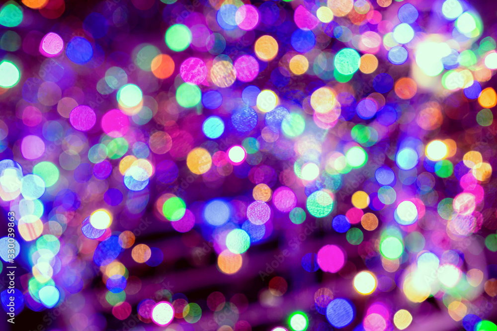 Christmas background. Festive elegant abstract background with colorful bokeh lights and stars Christmas background. Festive elegant abstract background with colorful bokeh lights and stars