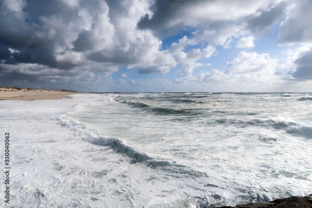 Sandy coast of the Atlantic ocean in Costa Nova Sandy coast of the Atlantic ocean in Costa Nova
