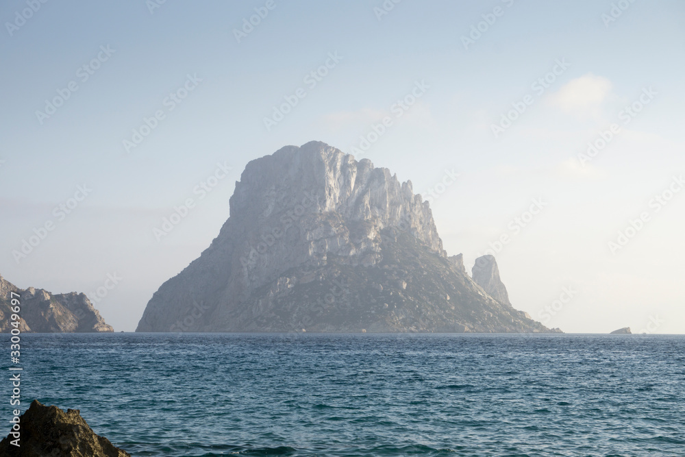 Sunset from Cala D Hort with Es Vedra island Ibiza Balearic islands Spain on June 20, 2019