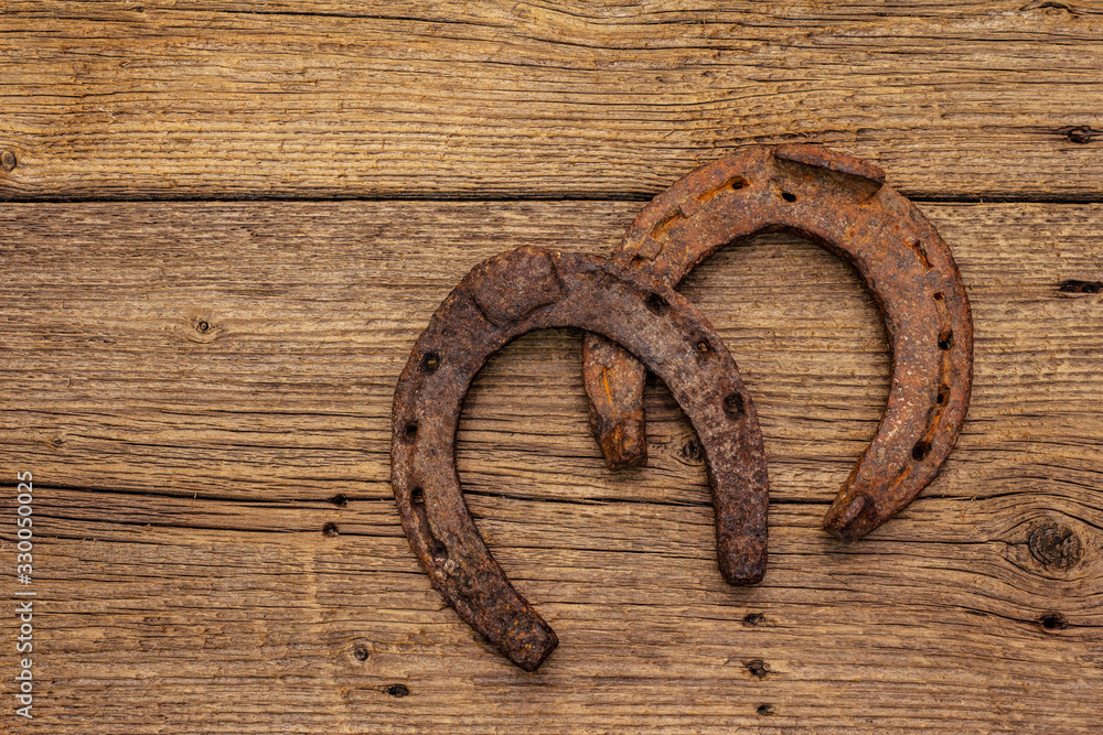 Cast iron metal horse horseshoes. Good luck symbol, St.Patrick's Day concept Cast iron metal horse horseshoes. Good luck symbol, St.Patrick's Day concept