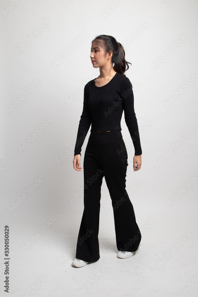 Full body of beautiful young asian woman walking. Full body of beautiful young asian woman walking.