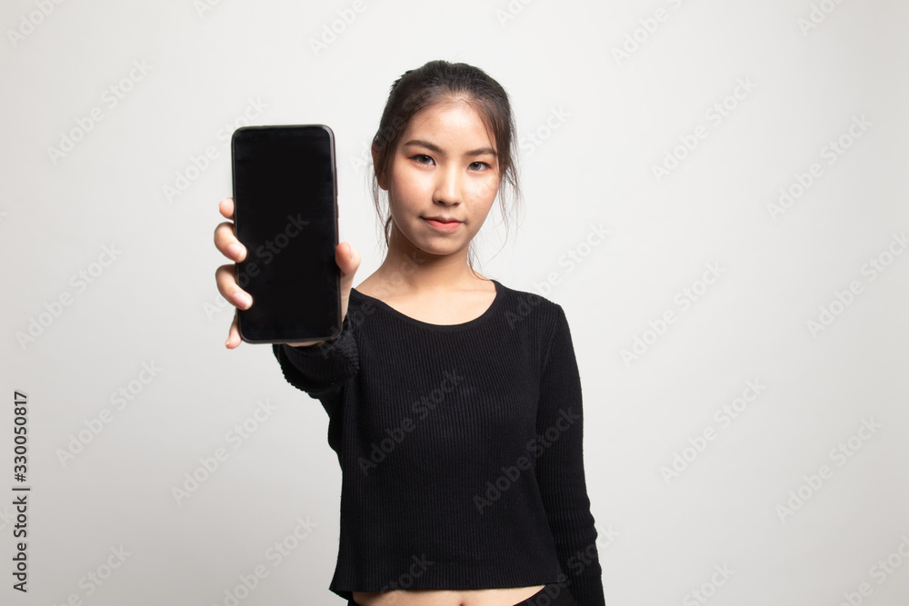 Young Asian woman with mobile phone. Young Asian woman with mobile phone.