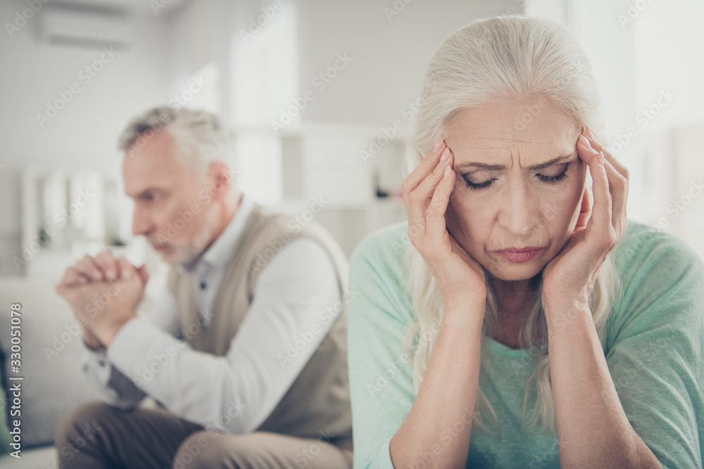 Obraz premium Close up photo of sad upset crying suffering from acute migraine old lady who is trying to calm down after noisy scandal with her spouse